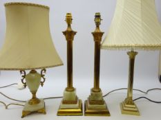 Pair oynx and gilt brass corinthium column table lamps,