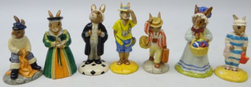 Seven Royal Doulton Bunnykins comprising Lawyer, Tourist, Father, Fisherman, Catherine Parr,