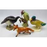 Four Beswick figures; Barnacle Goose 1052, Woodpecker 1218,