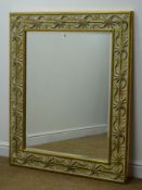 Large ornate gilt and cream bevel edge mirror, W99cm,