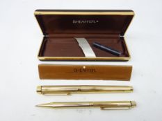 Sheaffer Targa gold-plated fountain and ball point pen set, 14k nib,