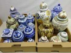 Twenty mostly oriental style lidded jars including Ringtons,