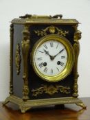 19th century gilt metal figural mounted ebonised mantle clock, white Roman dial with brass bezel,