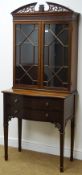 Edwardian Chippendale style mahogany cabinet, pierced swan neck pediment,