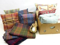 Four Tweed cushions and three throws,