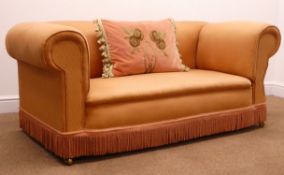 Victorian two seat drop arm sofa, upholstered in a pink farbric,
