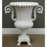 Painted classical style metal urn on square support with claw feet, W60cm,