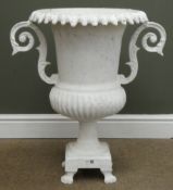 Painted classical style metal urn on square support with claw feet, W60cm,