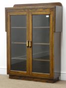 Early 20th century oak display bookcase, raised shaped back, carved frieze,