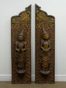 Pair Burmese hardwood figural screen hangings, carved with mythical beasts and trailing foliage,