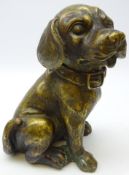 Patinated cast bronze model of a seated dog,