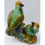 20th century Majolica model of two birds perched on a branch,