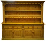 Large solid pine dresser, projecting cornice, carved and pierced rope twist frieze,