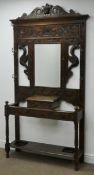 Victorian carved oak hallstand, shaped cresting rail, projecting cornice, bevel edge mirror,