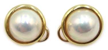 Pair of 14ct gold mabe pearl clip on earrings, stamped 585 Condition Report Approx 6.