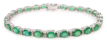 Oval emerald and diamond bracelet stamped 750, emeralds approx 8.3 carat, diamonds approx 0.
