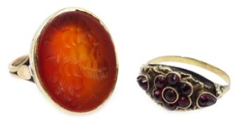 Cornelian intaglio seal gold ring and a 19th century continental garnet set ring stamped 14
