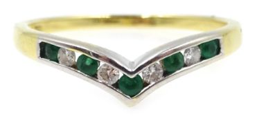 Emerald and diamond wishbone ring stamed 750 Condition Report P 2gm<a