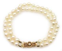 Double strand pearl bracelet with hallmarked 9ct gold pearl set clasp Condition Report