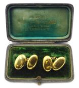 Pair of gold bean cufflinks, stamped 18c, approx 6.