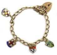 9ct gold chain bracelet with four gold and enamel charms hallmarked 14.