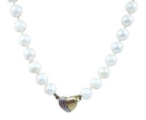 Single strand pearl necklace with gold heart clasp,