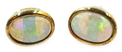 Pair of 9ct gold deep set opal ear-rings hallmarked Condition Report <a