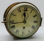 Smiths Astral ship's brass cased bulkhead clock, the white dial with Roman numerals,