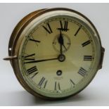 Smiths Astral ship's brass cased bulkhead clock, the white dial with Roman numerals,