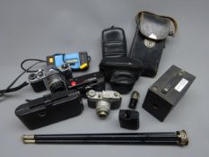 Asahi Pentax S1a 35mm camera, Comet Benici 127 camera, Kodak Fisher-Price camera,