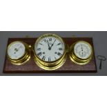 Ship's brass cased bulkhead clock, the dial inscribed FCC Precision,
