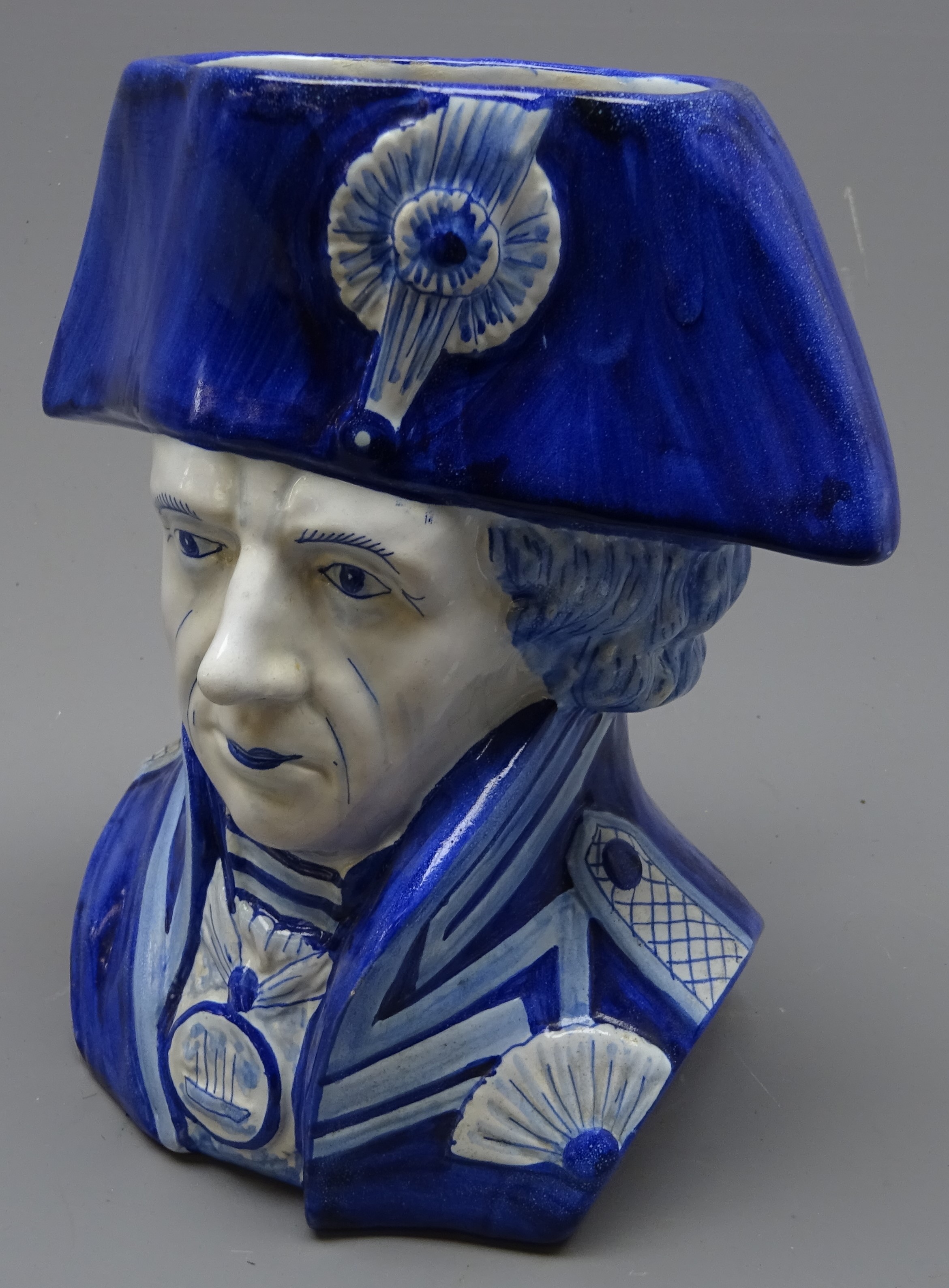 Delft blue & white character jug of Admiral Lord Nelson, H20.