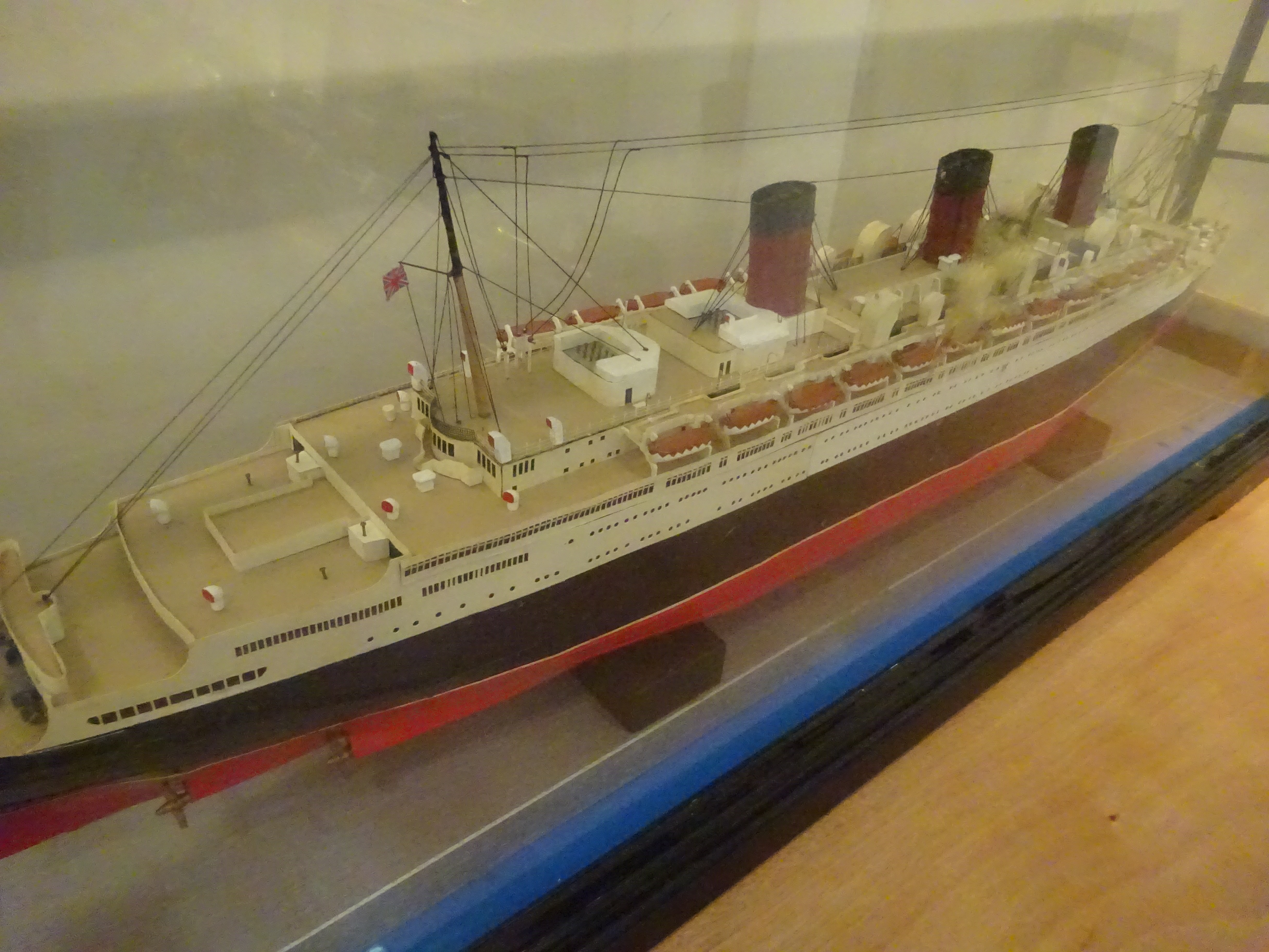 Large scale model of RMS Queen Mary, painted paper and card on frame, - Image 2 of 2