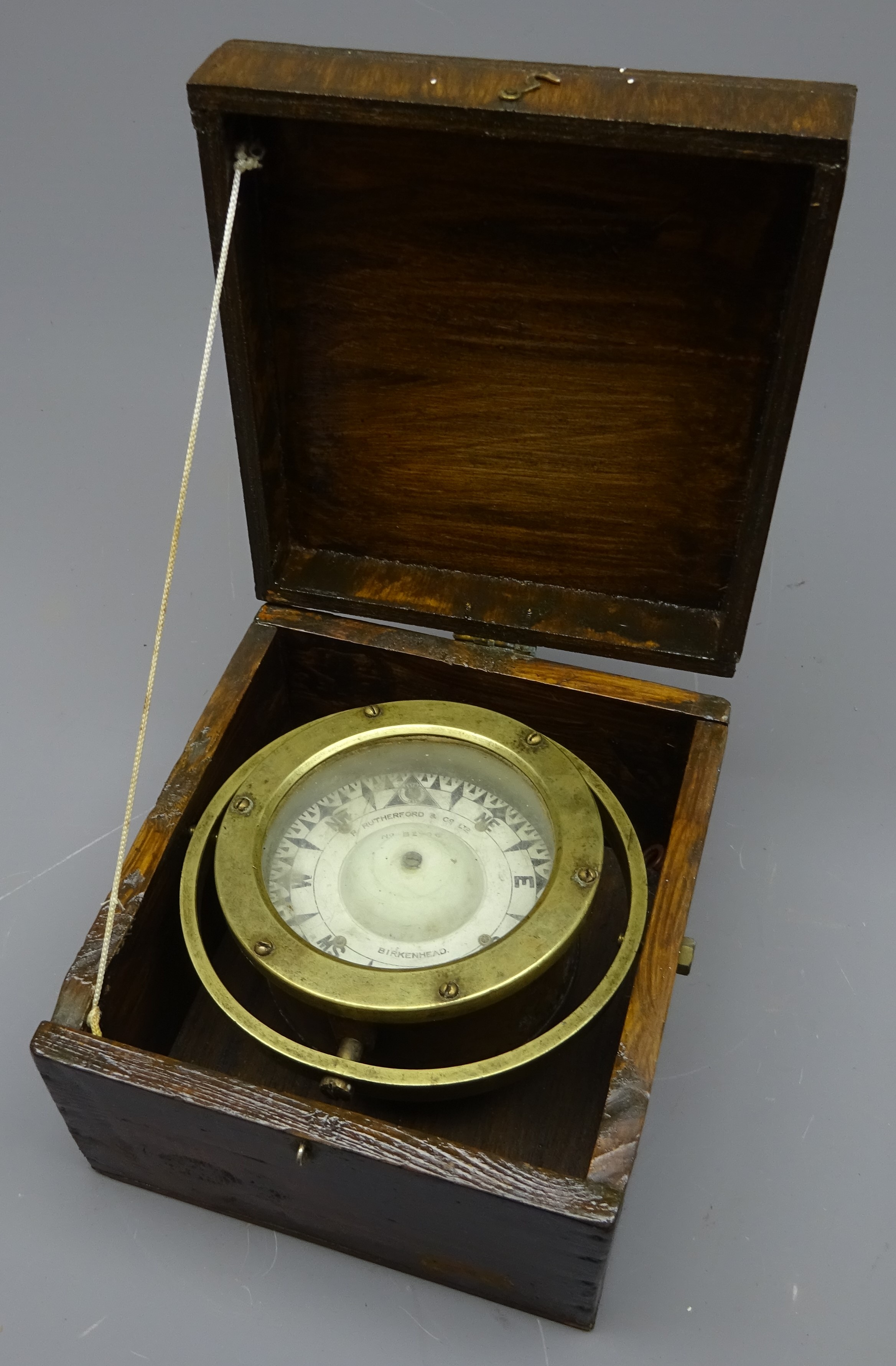 Brass cased ship's compass by Rutherford & Co.