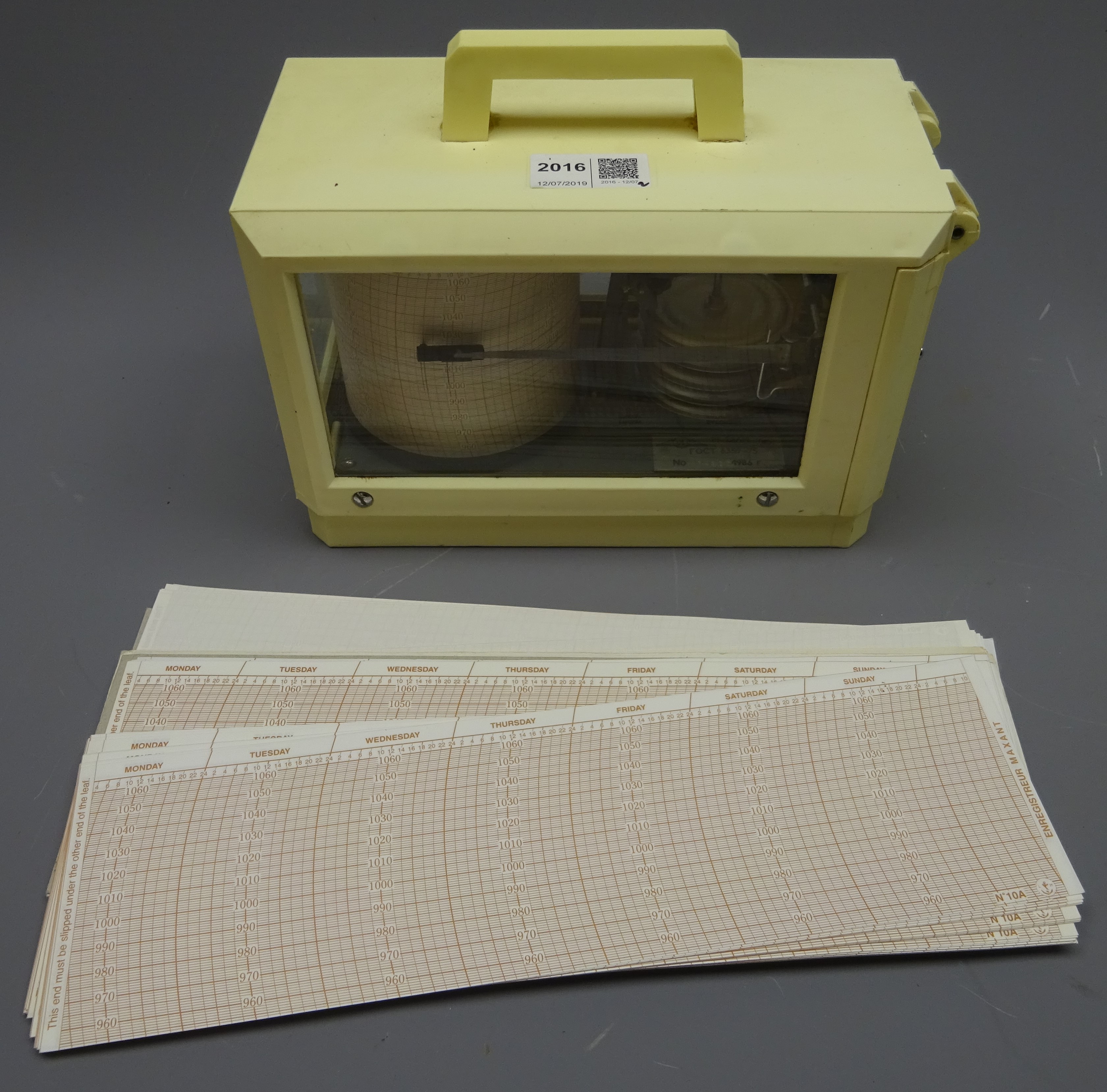 Modern barograph in ivory coloured plastic case, bears plaque with inscribed serial no.