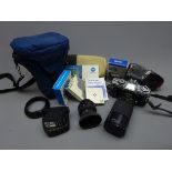Minolta XG-M 35mm camera with Tokina 35-200mm 1:3.5 - 4.