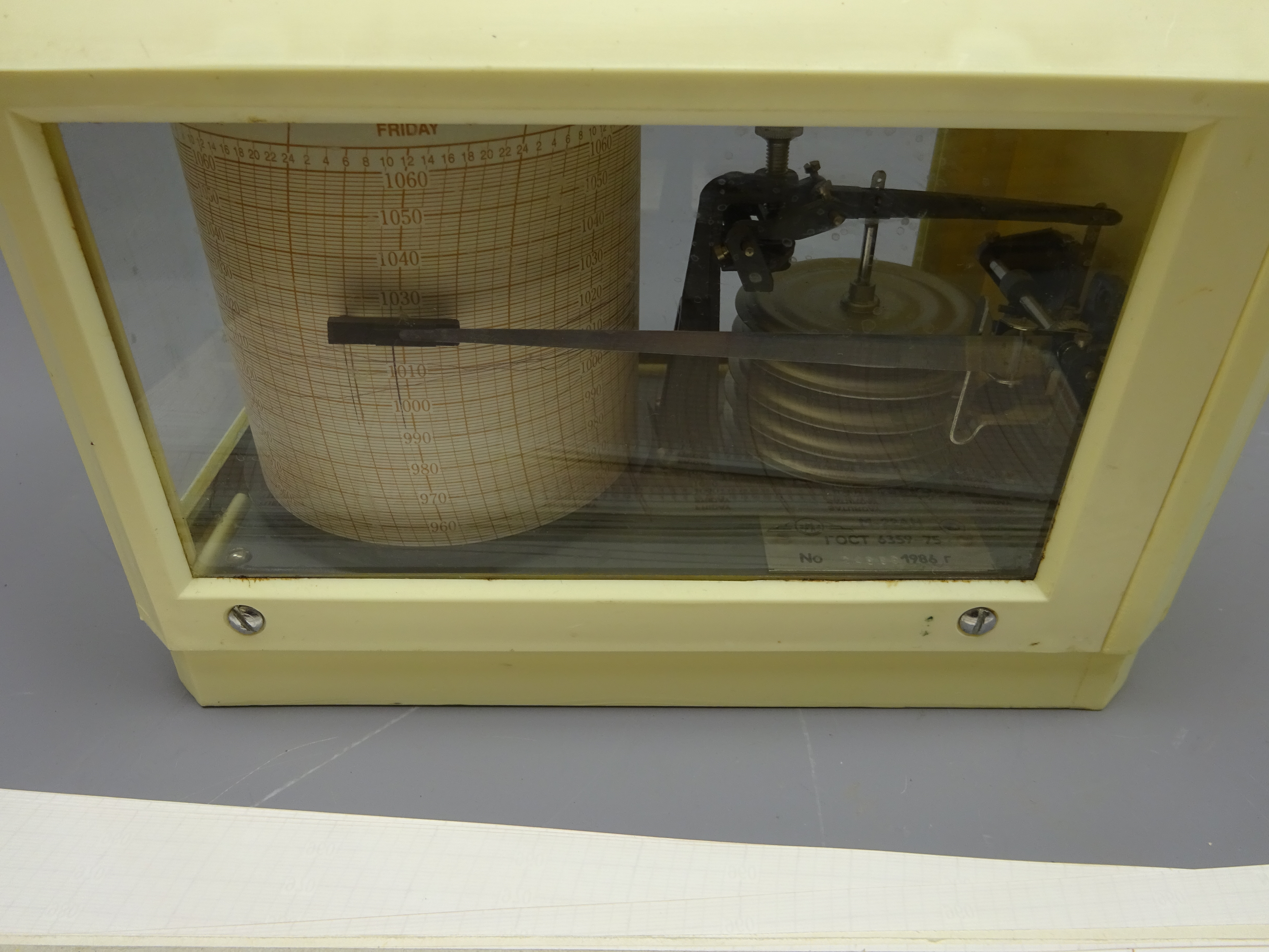 Modern barograph in ivory coloured plastic case, bears plaque with inscribed serial no. - Image 2 of 2