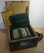 Felt & Tarrant Comptometer with green and white push buttons in green crackle case, No.
