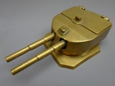 Brass two division inkwell in the form of a naval twin gun turret,