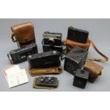 Seven vintage cameras comprising Contessa Pixie 4 x 6cm compact strut camera c1913, Kodak No.