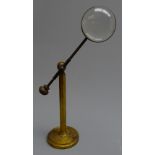 Late 19th/early 20th century gilt brass magnifying glass with convex lens on telescopic adjustable