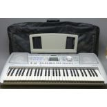 Yamaha PSR-290 61-key electronic keyboard with inbuilt speakers and music stand, L96cm,