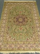Keshan green ground rug/carpet, central medallion, floral field,
