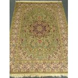 Keshan green ground rug/carpet, central medallion, floral field,