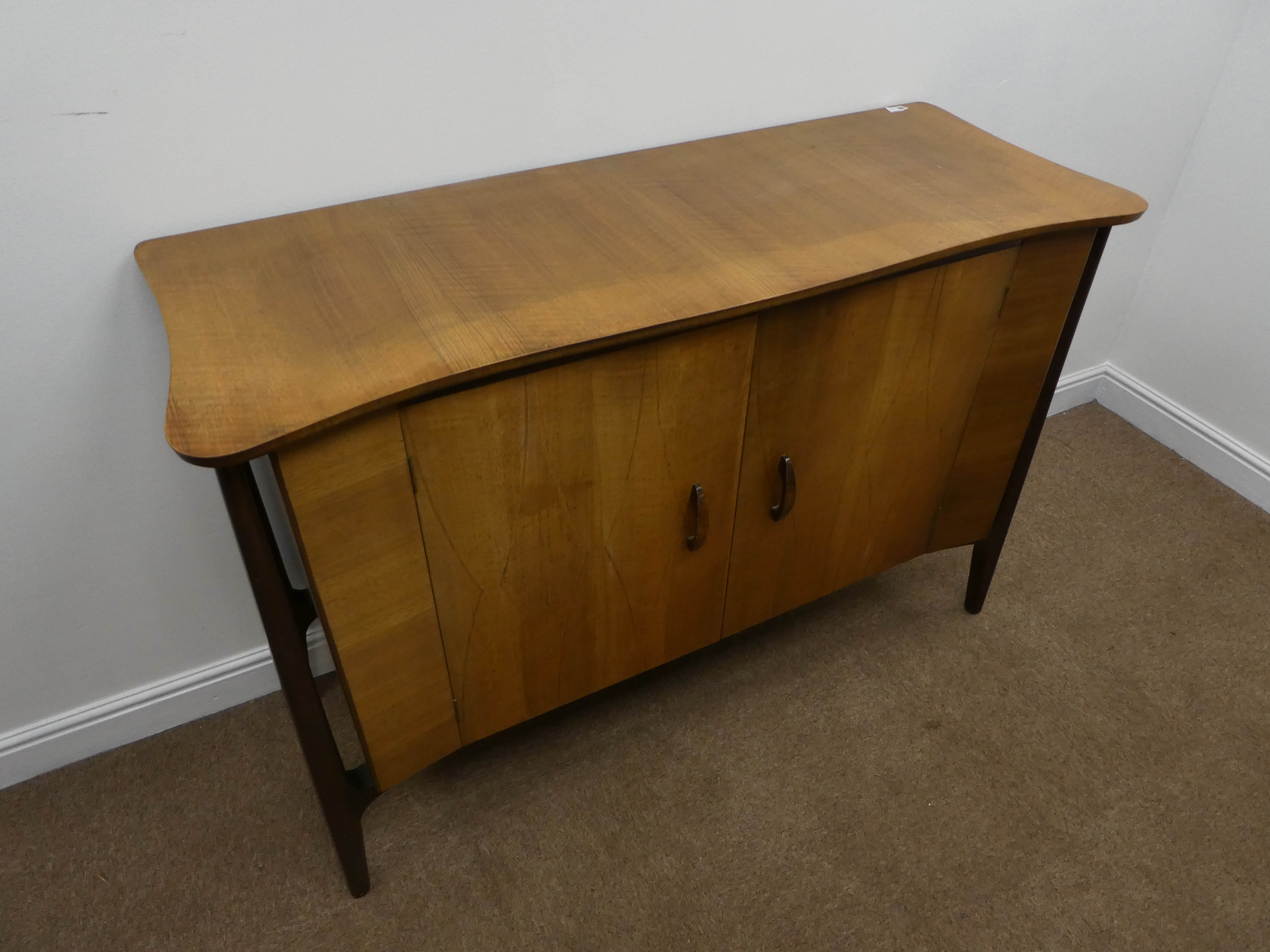 Mid 20th century teak side board, shaped top, two doors enclosing fitted maple interior, - Image 3 of 4