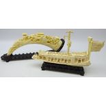 Ivory style resin model of a Chinese Junk & tusk, both on hardwood stands,