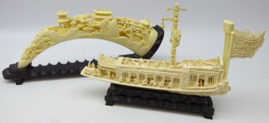 Ivory style resin model of a Chinese Junk & tusk, both on hardwood stands,