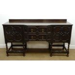 Early 20th century oak break front sideboard, raised back,