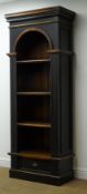 Edwardian style painted bookcase, moulded top, arched apeture, three shelves above single drawer,