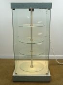 Large revolving display cabinet, three lights, two lockable doors, plinth base, W75cm, H161cm,